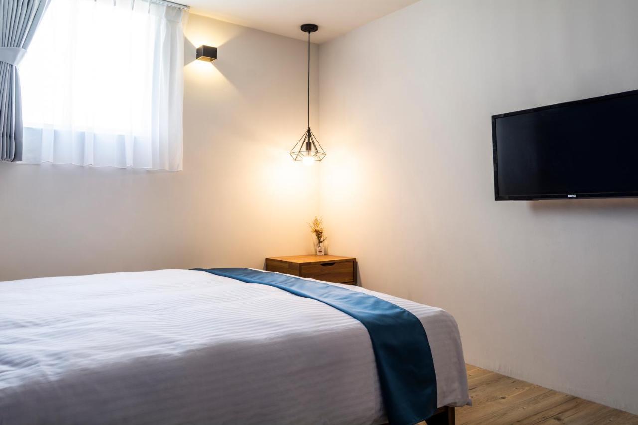 Mulan Light Inn Тайнан Екстериор снимка