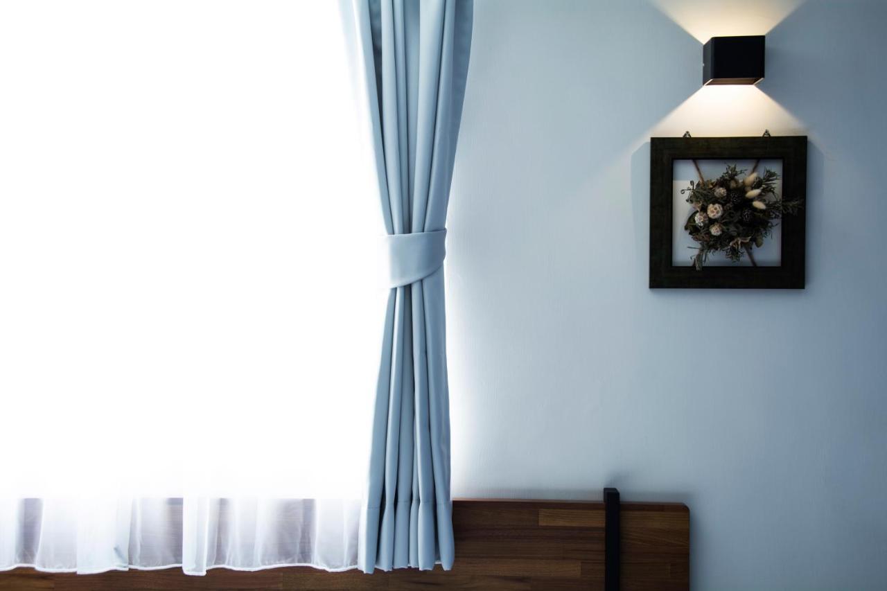 Mulan Light Inn Тайнан Екстериор снимка